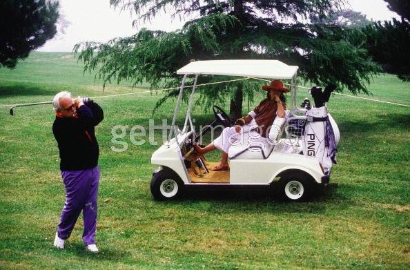 1983 watching dady's golf shot.jpg