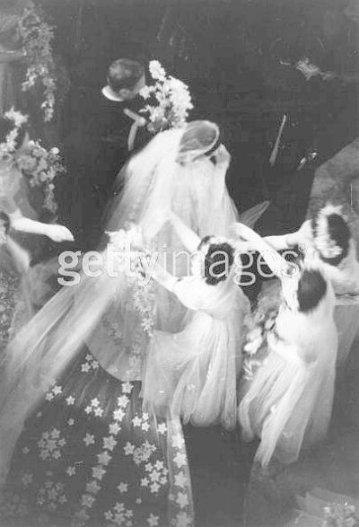 Bridesmaids arranging Princess Elizabeth's veil and train.jpg