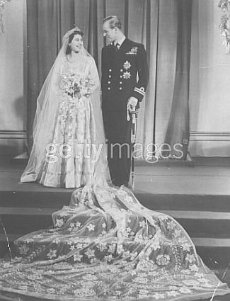 Elizabeth smiles at her husband in wedding portrait.jpg