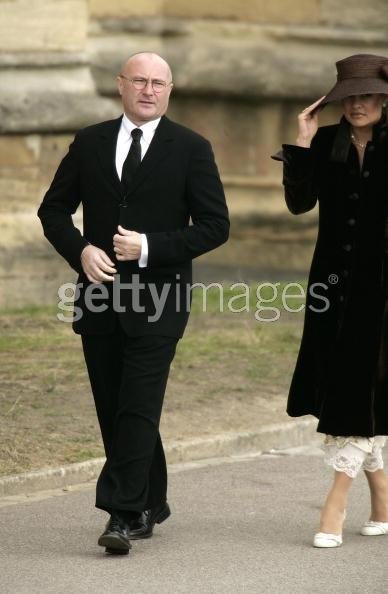 Charles and Camilla - Musician Phil Collins with wife Orianne.jpg