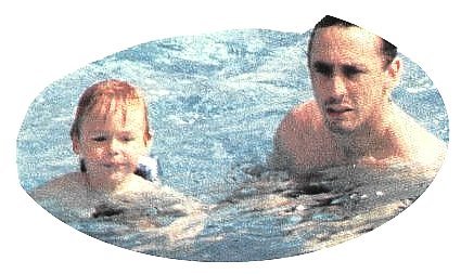 Louis @ the age of 3 , swimming with Dadddy.JPG