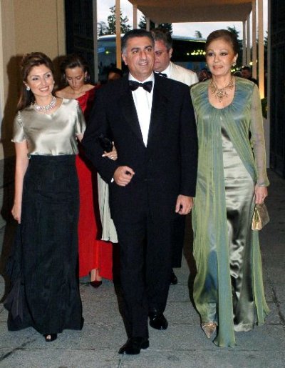 Reza Pahlavi with wife and mother.jpg