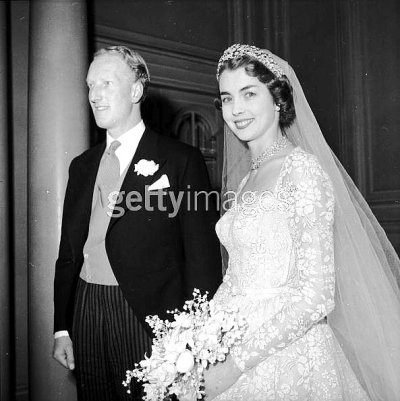 Earl of Dalkeith, son of Duke of Buccleuch, with bride Jane McNeil, ex-Hartnell model 2 01-24-53.jpg