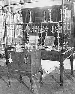 Elizabeth - silver candlesticks chest of drawers at St. James Palace.jpg