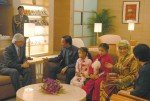 Their majesties with granddaughters.jpg